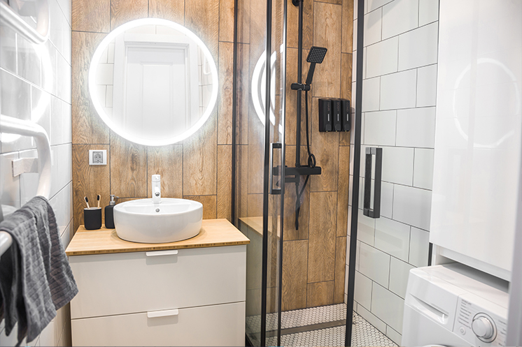 Un bagno piccolo con doccia e lavatrice: come arredarlo?